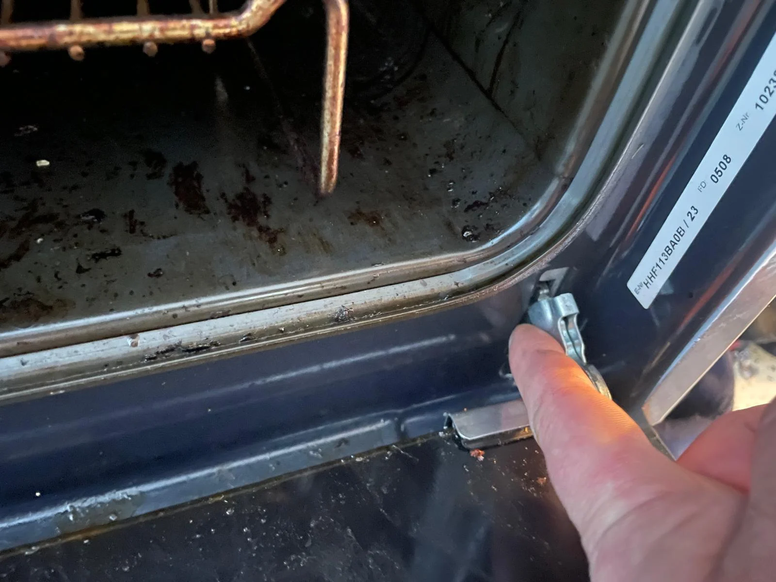 Oven door hinge replacement