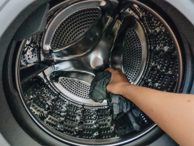 What causes a washing machine to smell